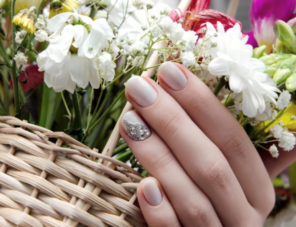 Spring nail polish colors come in bright and dark hues this year.