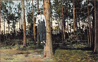 Lynching of an unidentified African American male. Date and location unknown. Tinted lithographed postcard. 5H x 3H".