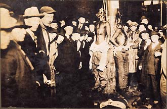 The lynching of nineteen-year-old Elias Clayton, nineteen-year-old Elmer Jackson, and twenty-year-old Isaac McGhie. June 15, 1920, Duluth, Minnesota.