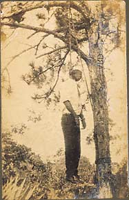The lynching of James Clark, handcuffed. July 11, 1926, Eau Gallie, Florida.