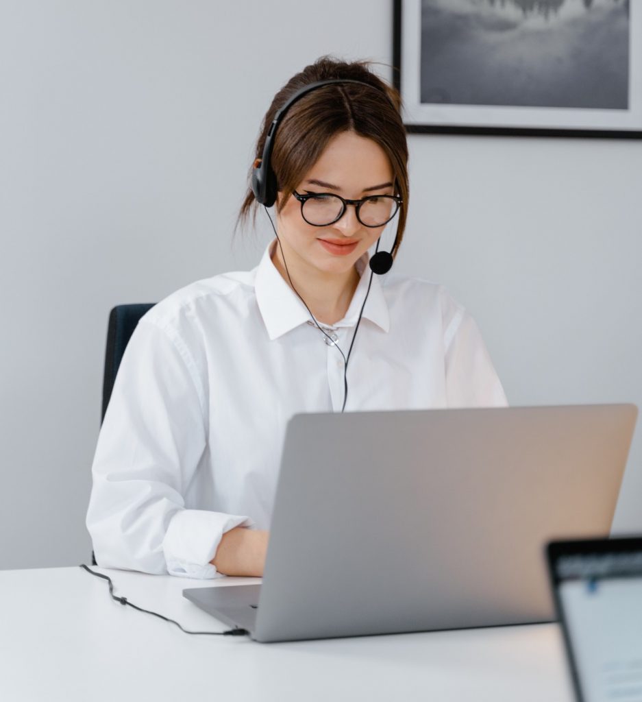 female receptionist answering calls