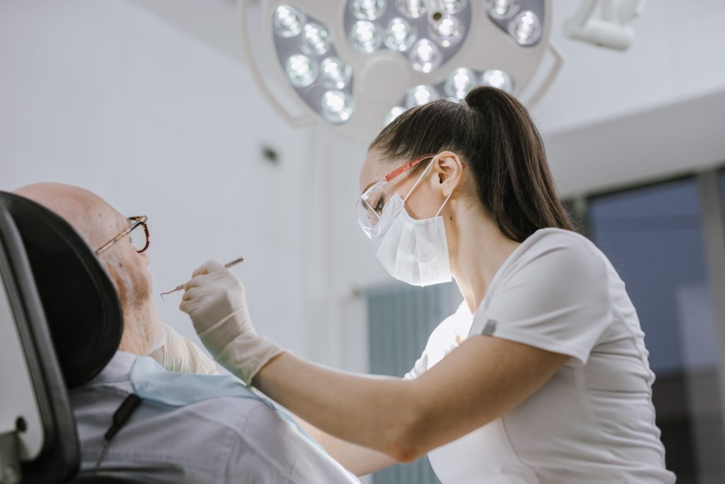 Dentist working on patient