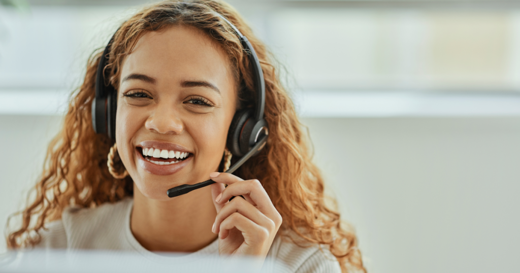 smiling receptionist with headset
