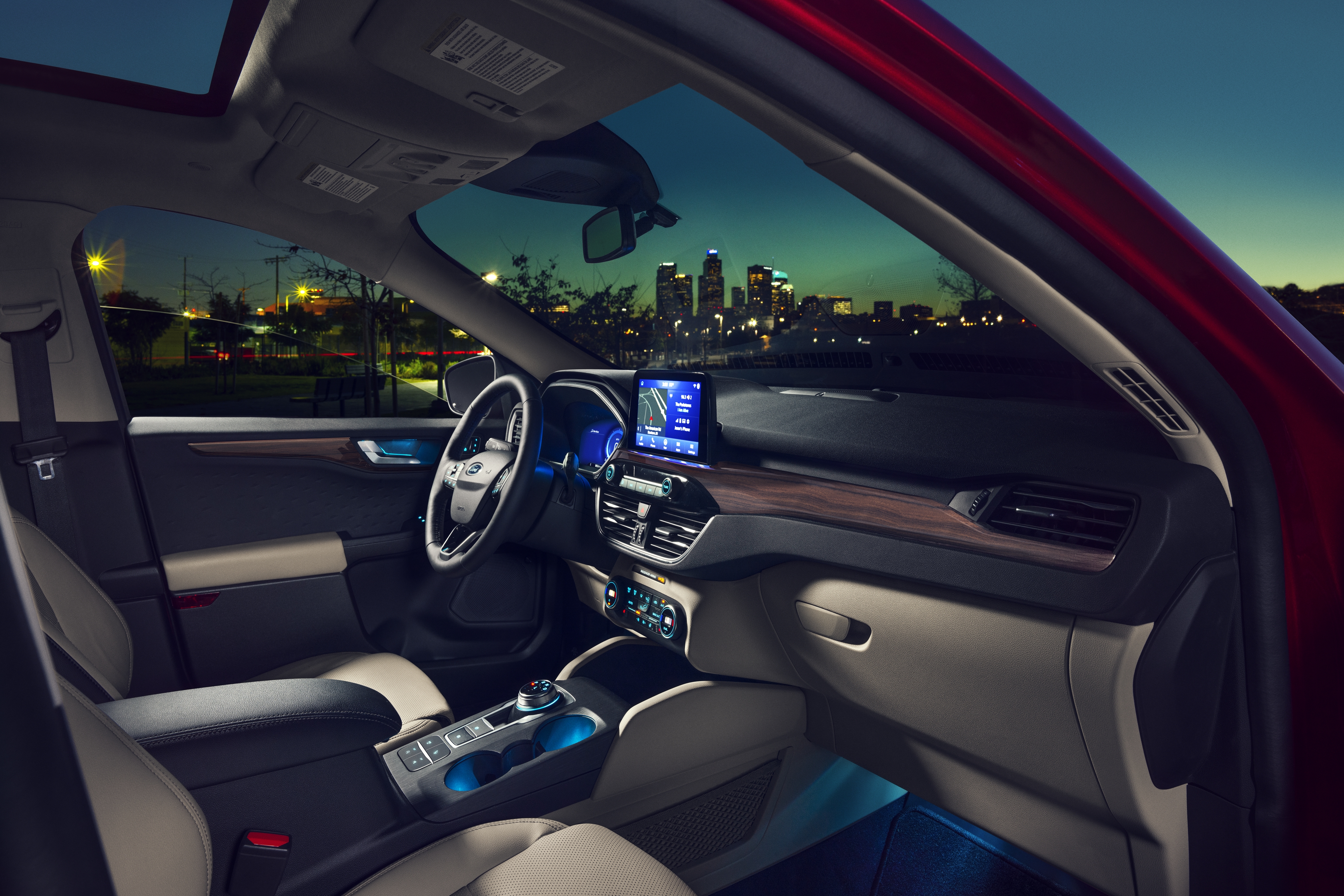 interior of a 2020 ford escape overlooking a city skyline at night