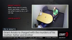 grant amato is visible on surveillance video during a police interview with text on screen of interview