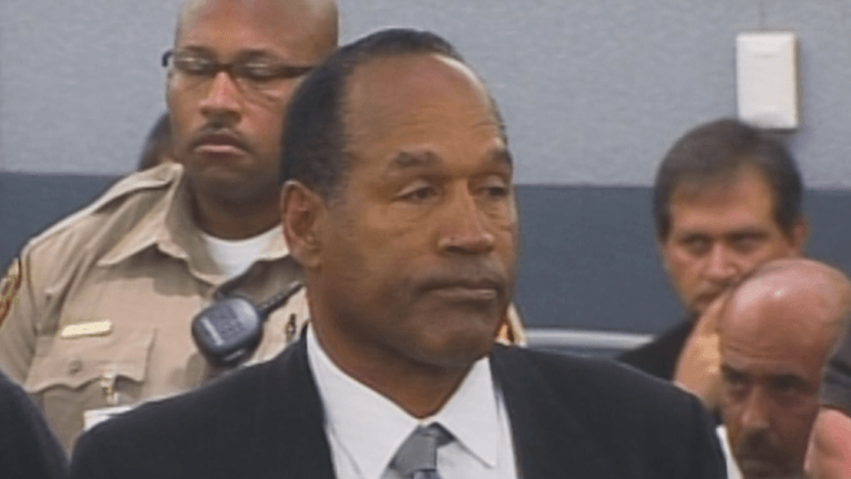 OJ Simpson reacts as the verdict is read in Vegas robbery case