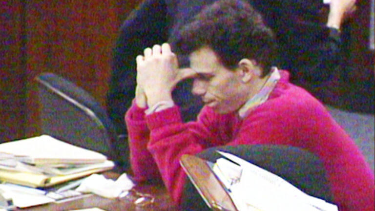 Erik Menendez listens to testimony during his murder trial