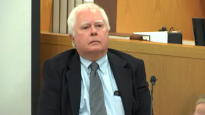 man in suit in court