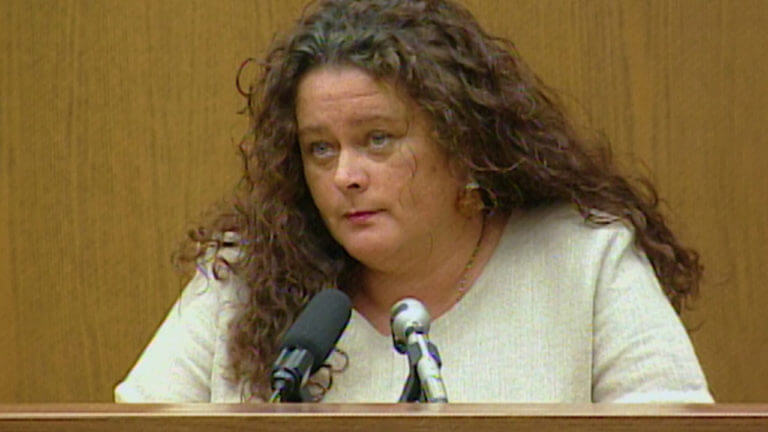 A woman testifies in court