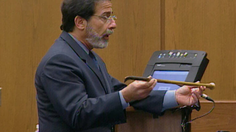 a man shows evidence to the jury