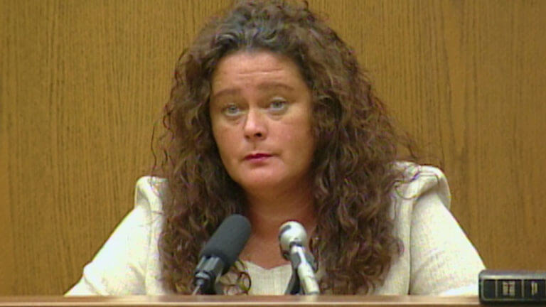 A woman testifies in court