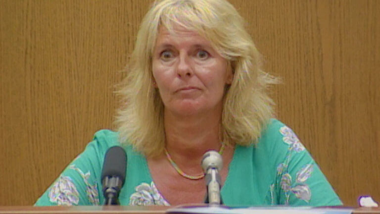 A woman testifies in court