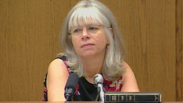 A woman testifies in court