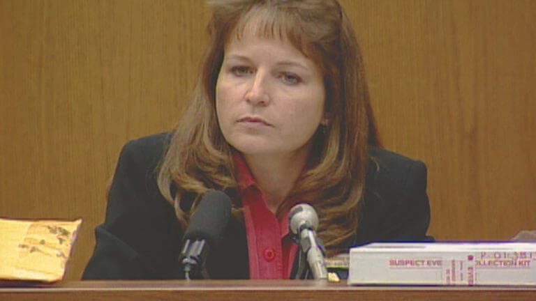 A woman testifies in court