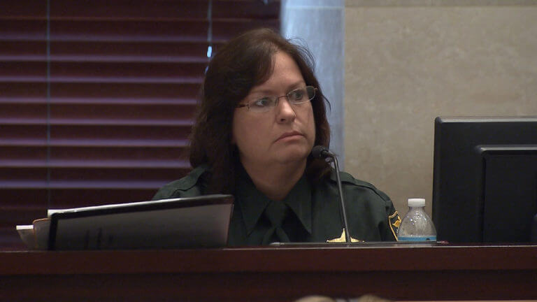 A woman testifies in court