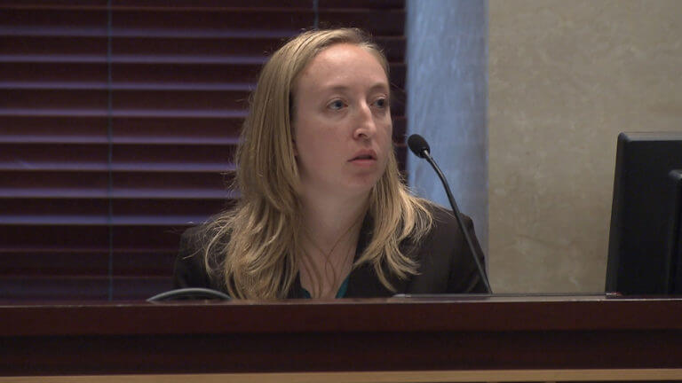 A woman testifies in court