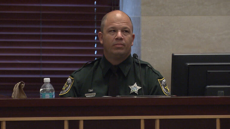 A deputy testifies in court.