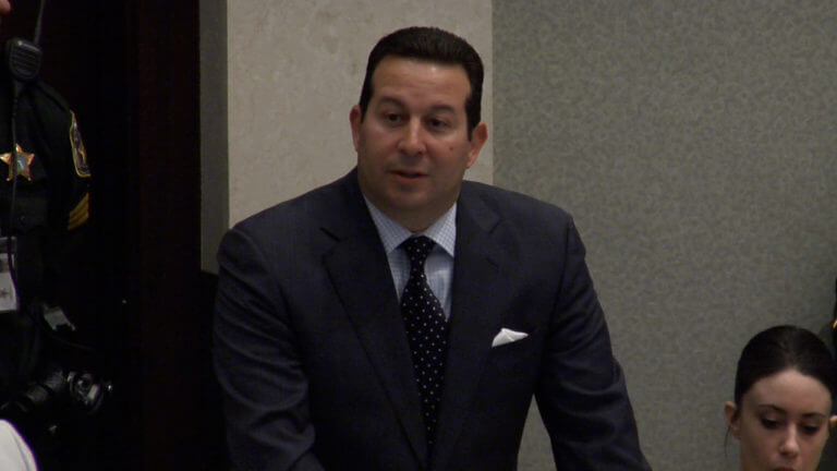 Jose Baez stands in court