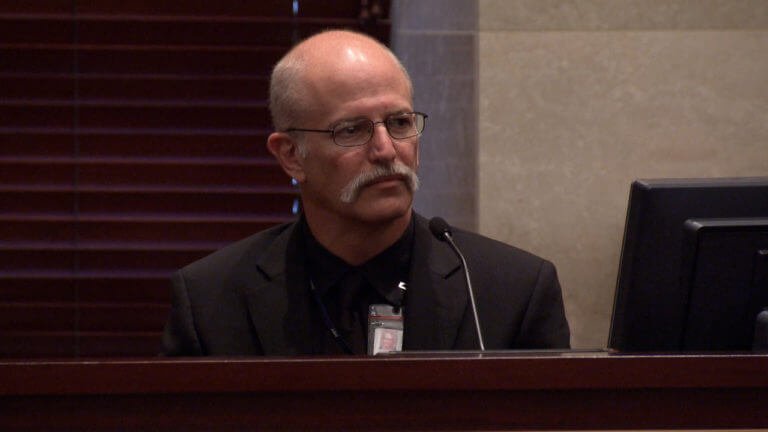 A man testifies in court