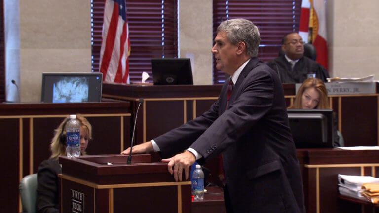 An attorney addresses the jury