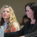 Lori Vallow Daybell glances at the camera during her hearing