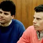 Lyle Menendez, right, and his brother, Erik, sit in the courtroom