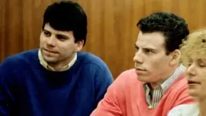 Lyle Menendez, right, and his brother, Erik, sit in the courtroom