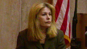 A woman testifies in court