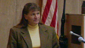 A woman testifies in court