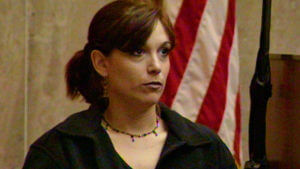 A woman testifies in court