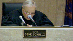 A judge speaks from the bench