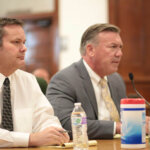 Chad Daybell sits with his attorney in court