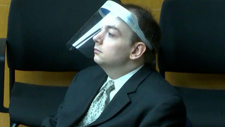 Joel Guy reacts as the jury's verdict is read in his double murder trial