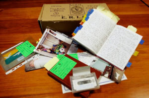 Evidence including a diary belonging to Kathleen Folbigg is displayed on a table