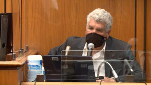 A man testifies in court