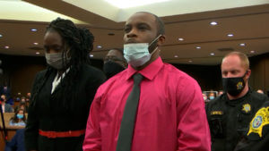 Nathaniel Rowland listens as the judge sentences him for murder