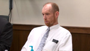 Chad Isaak listens to closing arguments at his triple murder trial