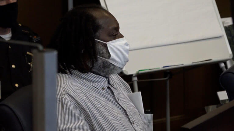 Stanley Ford listens to testimony in his quadruple murder trial