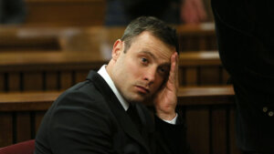 Oscar Pistorius sits in court