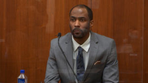 Defendant Theodore Edgecomb testifies in his murder trial.