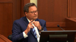 Orthopedic surgeon Dr. Robert Moore takes the stand