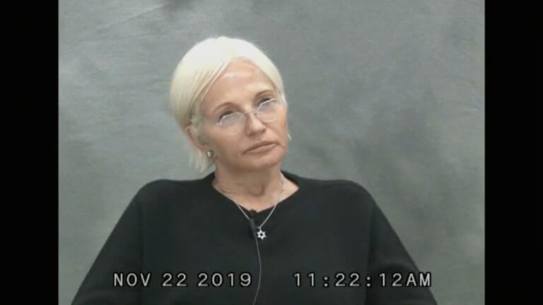 The jury views video deposition from Ellen Barkin