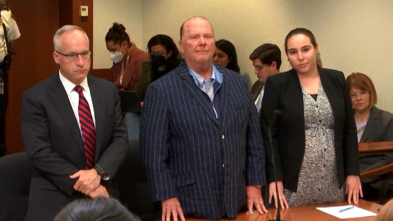 Celebrity chef Mario Batali reacts after being found not guilty of indecent assault and battery