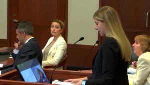 amber heard watches her attorney question tara roberts