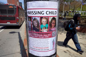 Missing child poster featuring Harmony Montgomery wrapped around a pole.