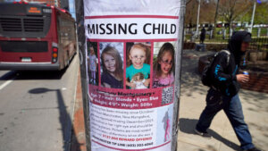 Missing child poster featuring Harmony Montgomery wrapped around a pole.