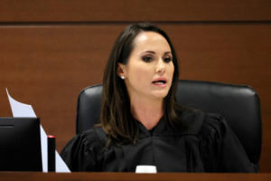 Judge Elizabeth Scherer speaks from the bench