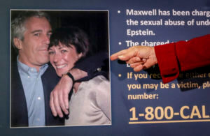 points to a photo of Jeffrey Epstein and Ghislaine Maxwell