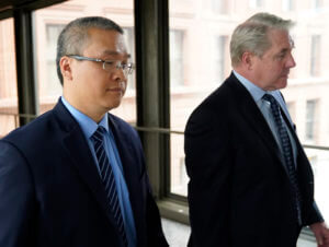 Former Minneapolis police officer Tou Thao, left, and his attorney Robert Paule arrive for sentencing for violating George Floyd's civil rights
