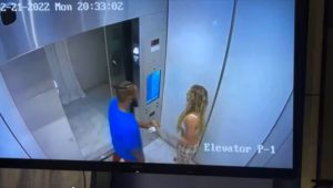 Courtney Clenney and her boyfriend, Christian Obumseli inside the elevator of their apartment building